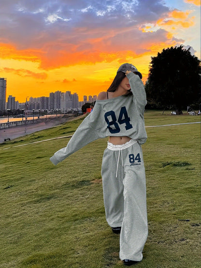 Women'S Fashionable Casual Off-the-shoulder Top and Trousers Two-piece Set, Loose-fitting Geometric Print Trousers, Long Sleeves, Loose Fit, Digital Print, Drawstring Detail, Suitable for Casual Attire, Combining Comfort and Fashion.