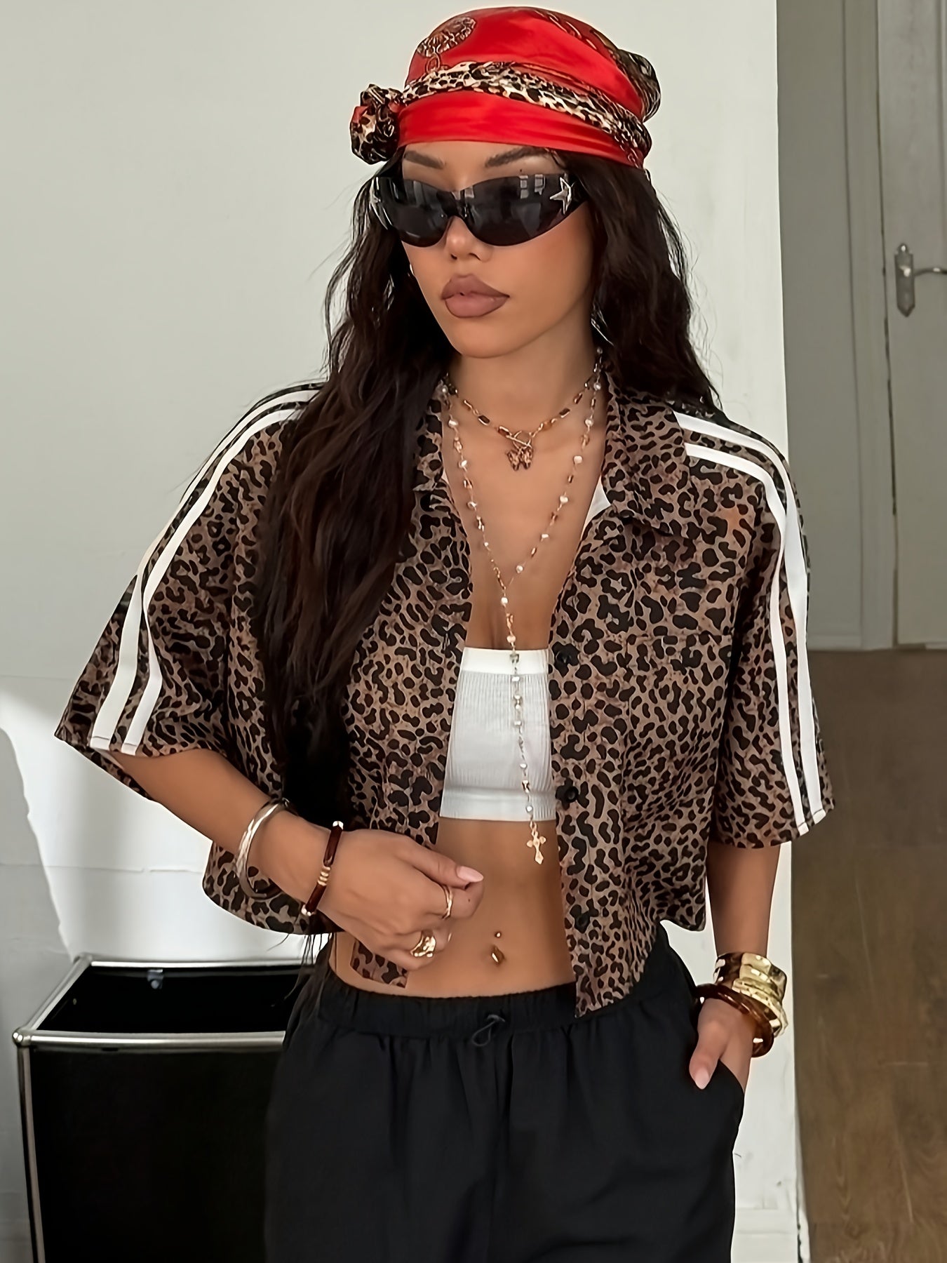 Women'S Y2K Leopard Print Crop Top with Button Details - Black & Brown Animal Print Shirt, White Cropped Tank, Black Pants, Red Headband, Layered Necklaces, and Accessories, Casual Chic Outfit, Casual Chic Outfit | Y2K Fashion | Button Detail Shirt